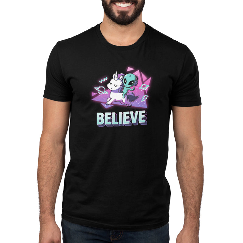 A man wearing a black t-shirt that says "TeeTurtle I Believe".