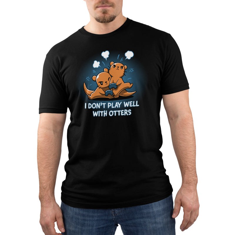 A man wearing a black t-shirt featuring the text "I Don't Play Well with Otters" by TeeTurtle.