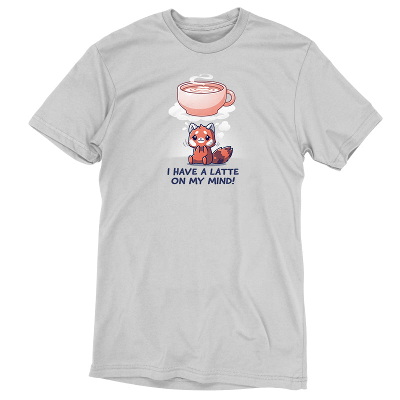 The "I Have a Latte on My Mind" by monsterdigital is a gray, unisex tee featuring a cartoon red panda looking up at a cloud-shaped latte with the text "I have a latte on my mind!" Made from super soft ringspun cotton.