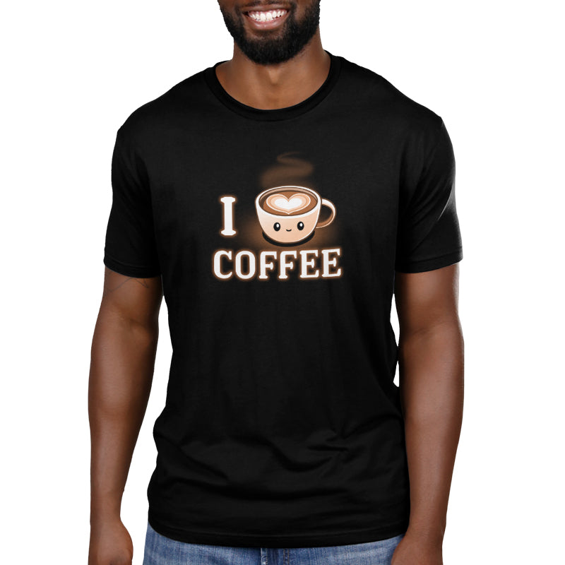 A man wearing a comfortable black TeeTurtle I <3 Coffee T-shirt expresses his love for coffee.