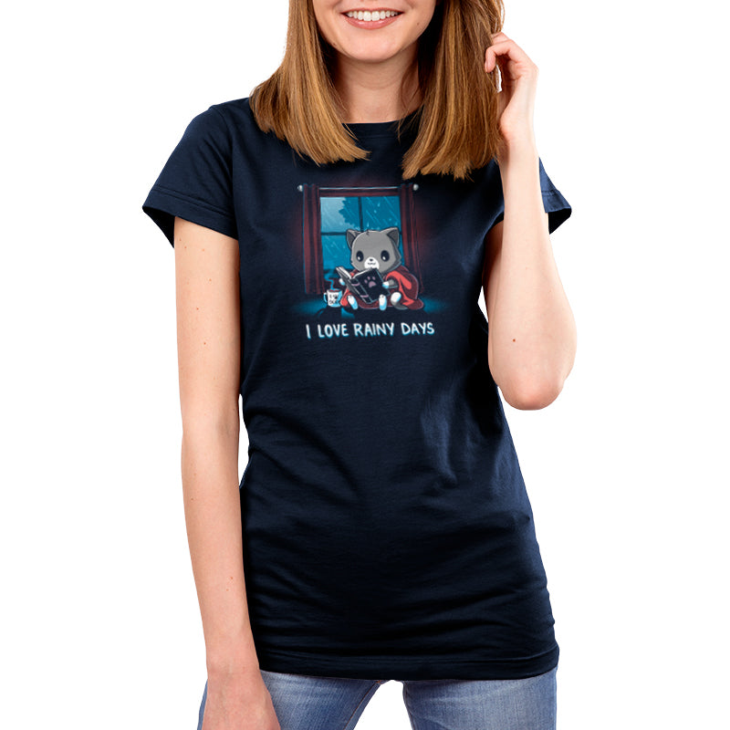 A woman wearing the "I Love Rainy Days" t-shirt by TeeTurtle.
