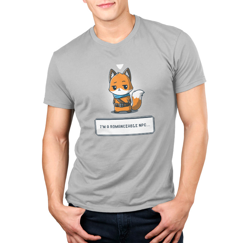 A man wearing a grey T-shirt with a fox on it made of super soft ringspun cotton, called "I'm a Romanceable NPC" by TeeTurtle.