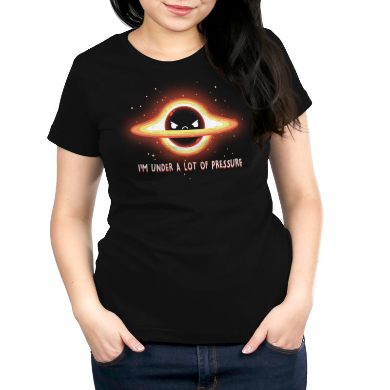 A woman wearing a comfortable black t-shirt named "I'm Under a Lot of Pressure" from the brand TeeTurtle.