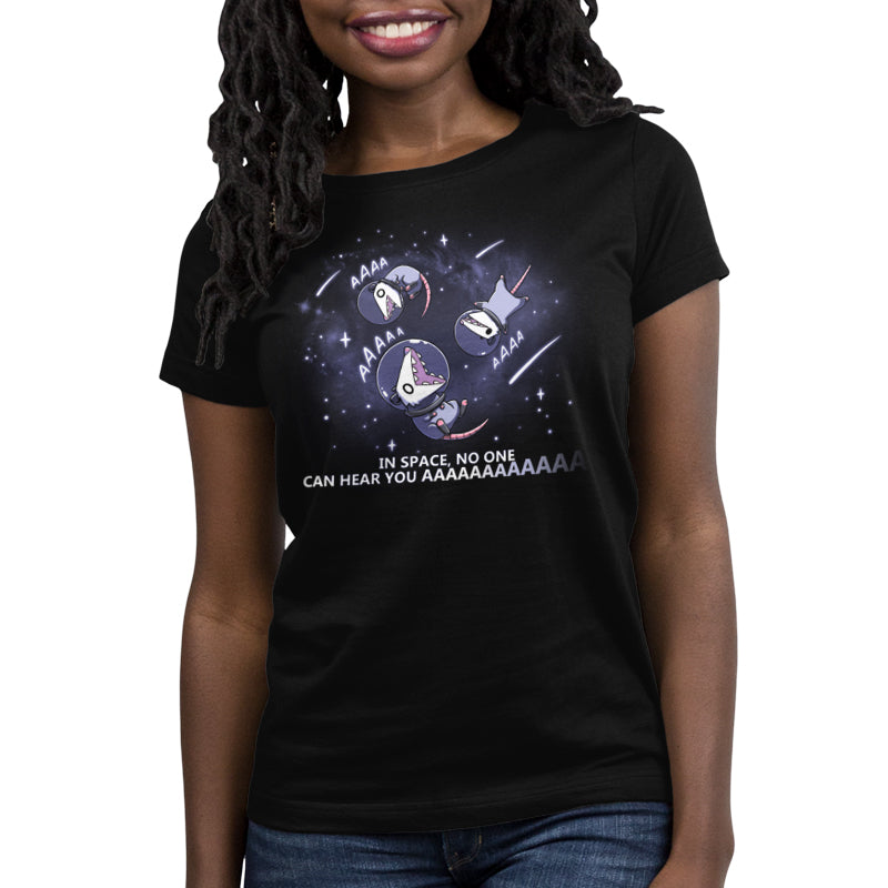 Woman wearing a TeeTurtle "In Space, No One Can Hear You AAAAAA" black t-shirt with a humorous space-themed graphic and text.