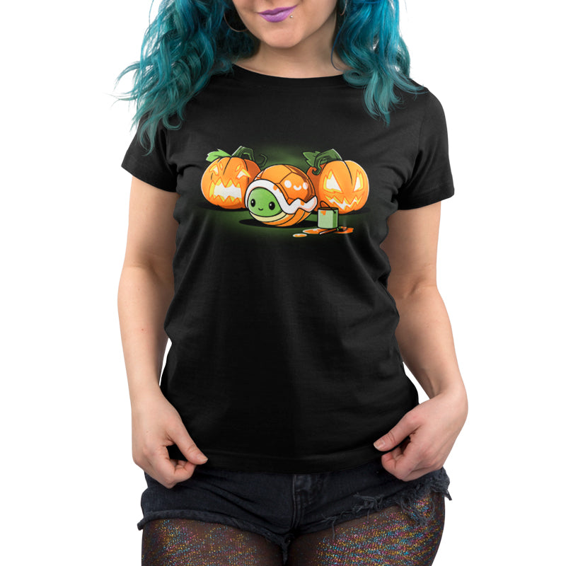 A women's black t-shirt featuring two TeeTurtle Jack-o-Lantern Turtle pumpkins that blend into spooky surroundings.
