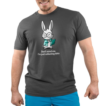 A man wearing a TeeTurtle t-shirt with a rabbit wearing glasses, Just Collecting Data.