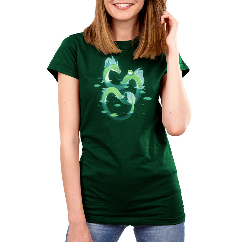 A woman wearing a Lagoon Dragon t-shirt with a fish on it. (Brand name: TeeTurtle)