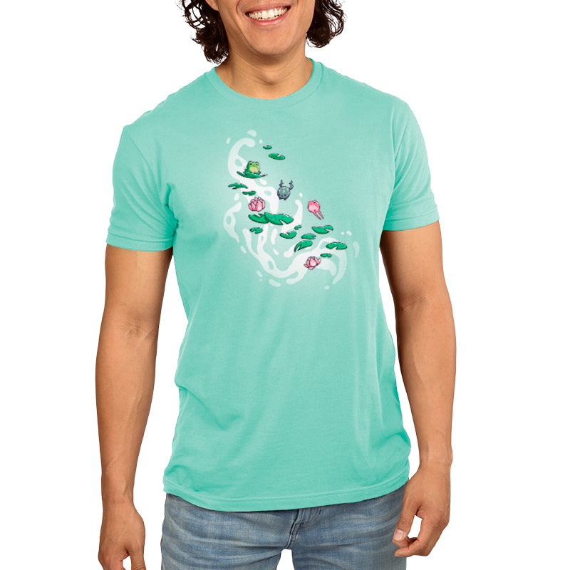 A man wearing a comfortable turquoise Leaping Lily Pads T-shirt by TeeTurtle.