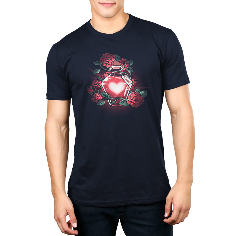 A man wearing a TeeTurtle Love Potion navy blue t-shirt with roses on it.