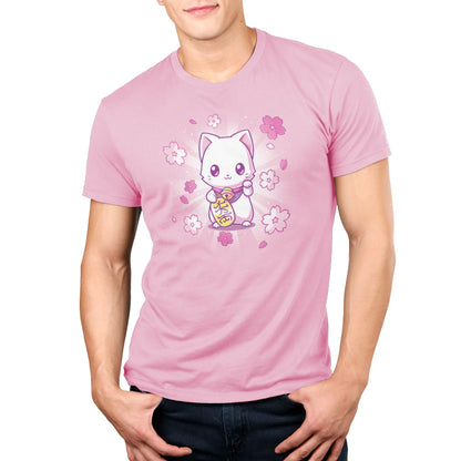 A man wearing a pink t-shirt with a TeeTurtle Lucky Sakura Kitty on it.