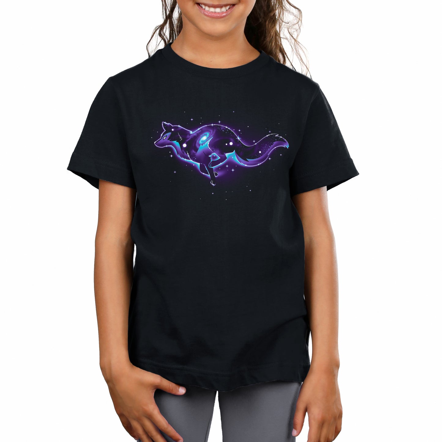 A girl wearing a black Lupine Constellation t-shirt by TeeTurtle, with an image of a cat in space enjoying comfort.