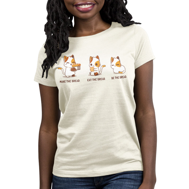A woman wearing a cozy TeeTurtle women's t-shirt with a cat on it.