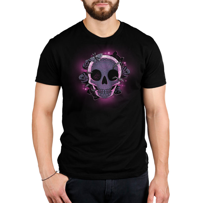 A man wearing a black t-shirt with a TeeTurtle Memento Mori skull on it.