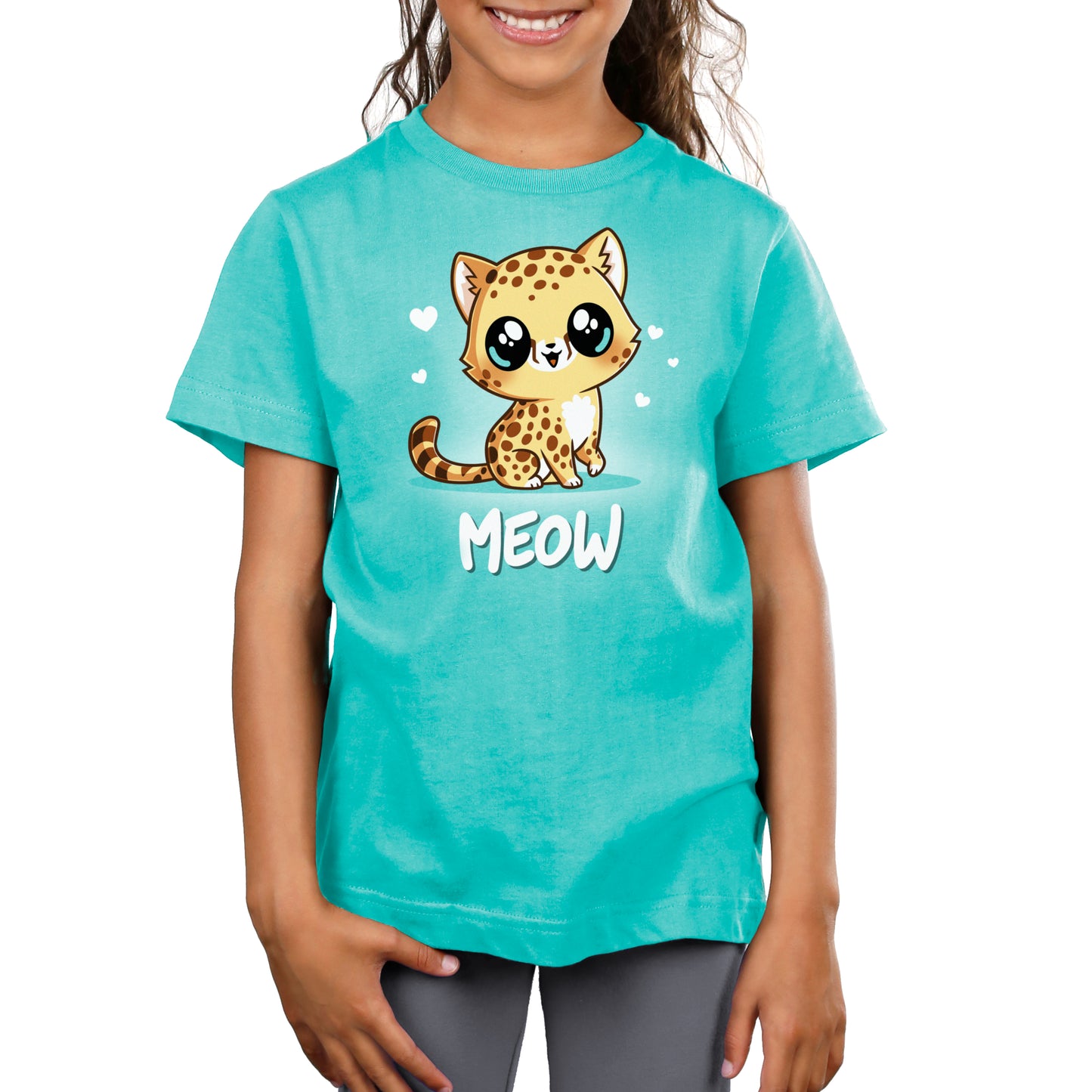 A girl wearing a TeeTurtle turquoise cheetah t-shirt that says Meow.