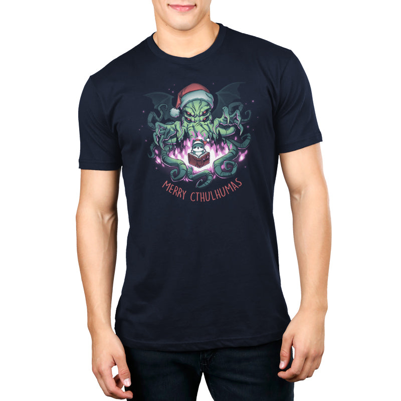 A man wearing a navy blue t-shirt that says Merry Cthulhumas by TeeTurtle.