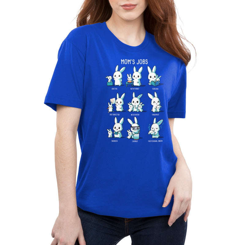 A teacher wearing a blue Mom's Jobs t-shirt with a bunny on it from TeeTurtle.