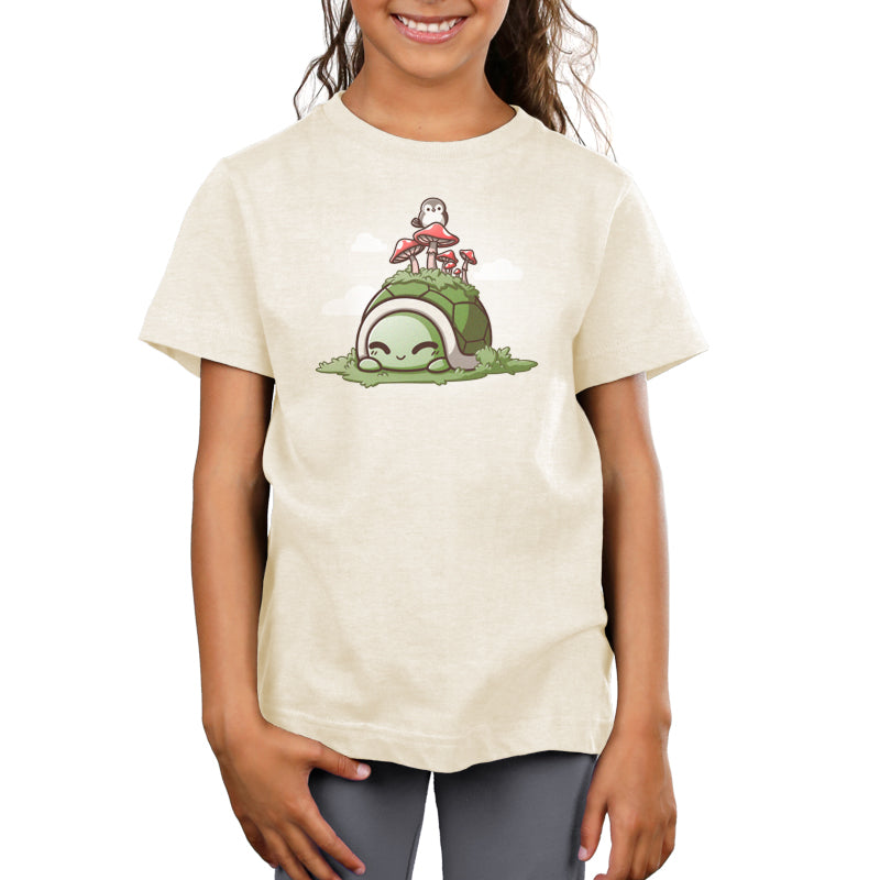 A girl wearing a comfortable TeeTurtle T-shirt with a Mossy Toadstool Turtle design.