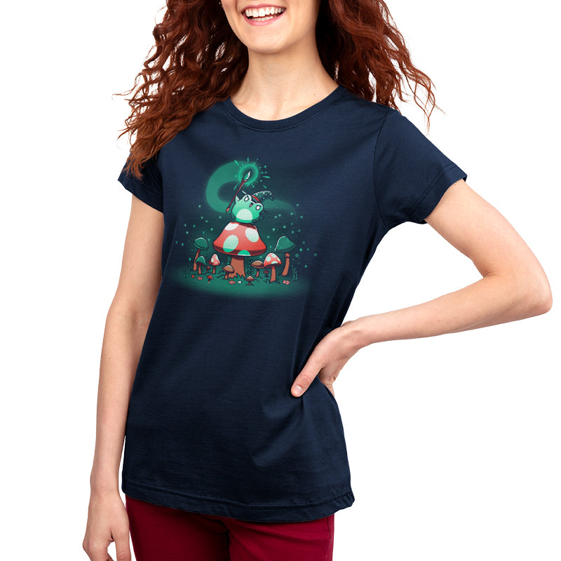 A woman smiling with red hair, wearing a TeeTurtle Mushroom Sorcerer t-shirt.