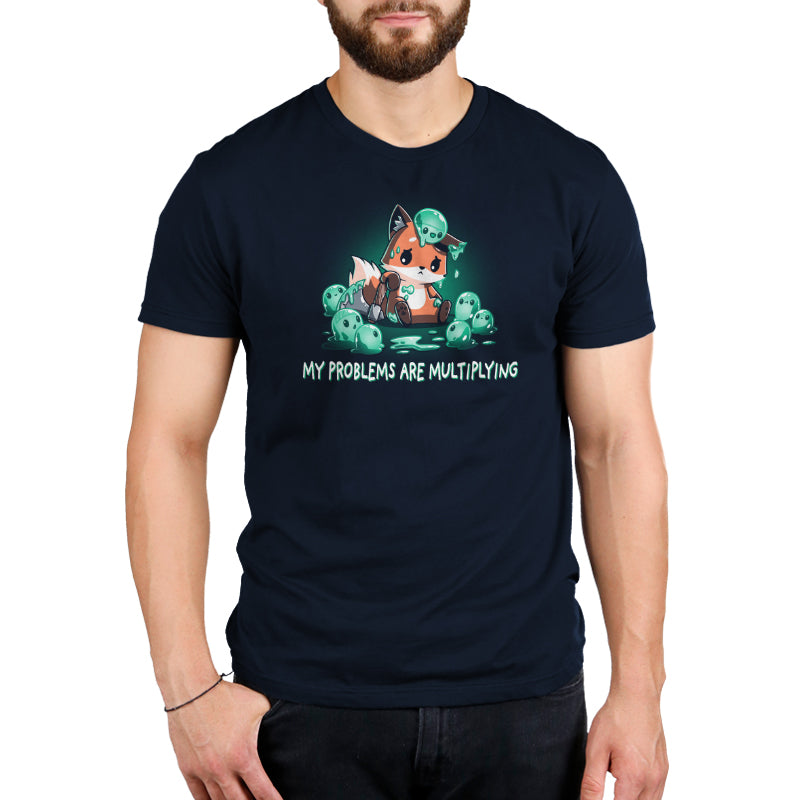 A man wearing a navy blue "My Problems are Multiplying" T-shirt by TeeTurtle.