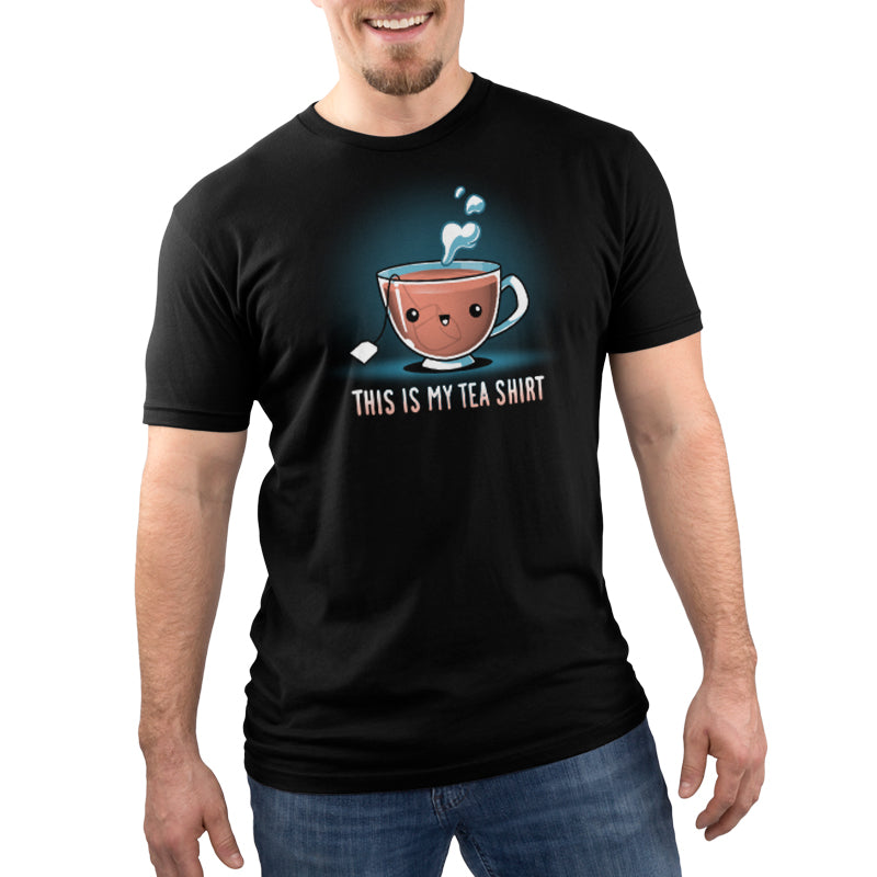 A man wearing a black My Tea Shirt with a looser fit that says this is tea time.