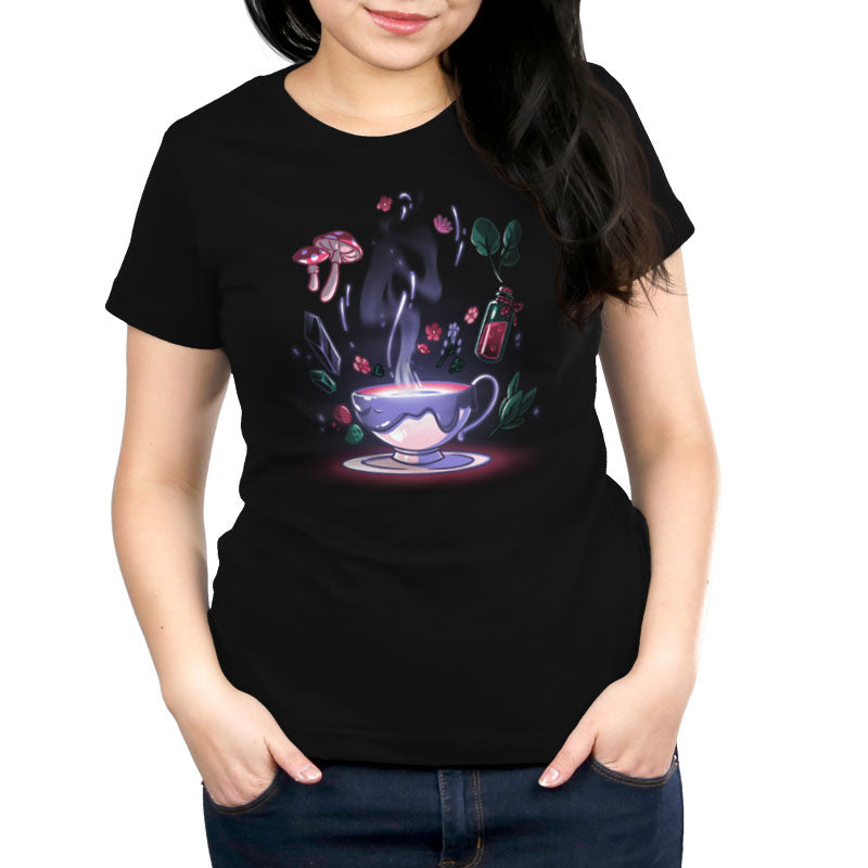 A women's black t-shirt with an image of Mystic Tea from TeeTurtle.