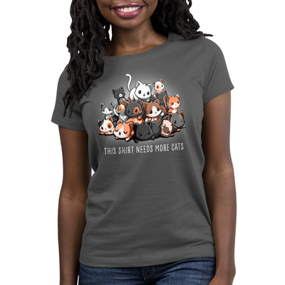 Premium Cotton T-shirt_TeeTurtle charcoal gray Needs More Cats apparel  featuring a pile of different colored cats with various expressions, caption reads "this shirt needs more cats".