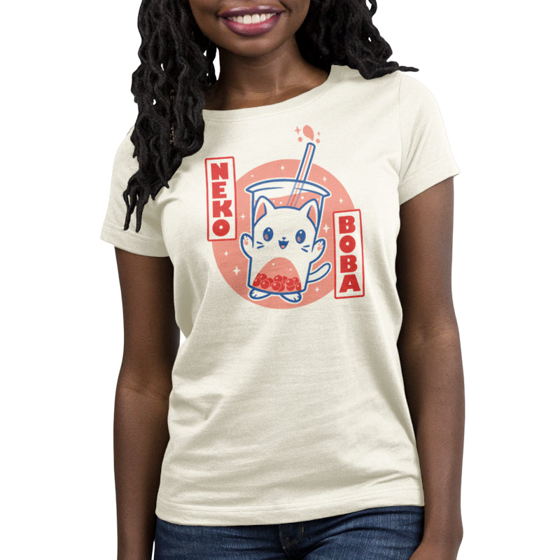 A woman wearing a TeeTurtle Neko Boba t-shirt with a cat on it.