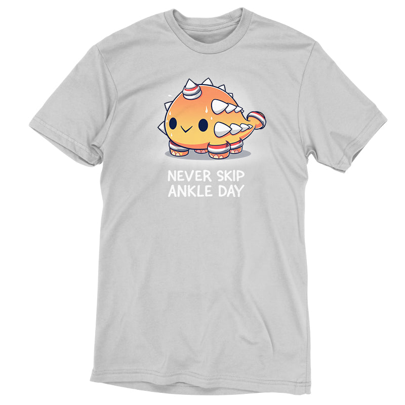 A TeeTurtle Never Skip Ankle Day gray t-shirt with an orange fish.