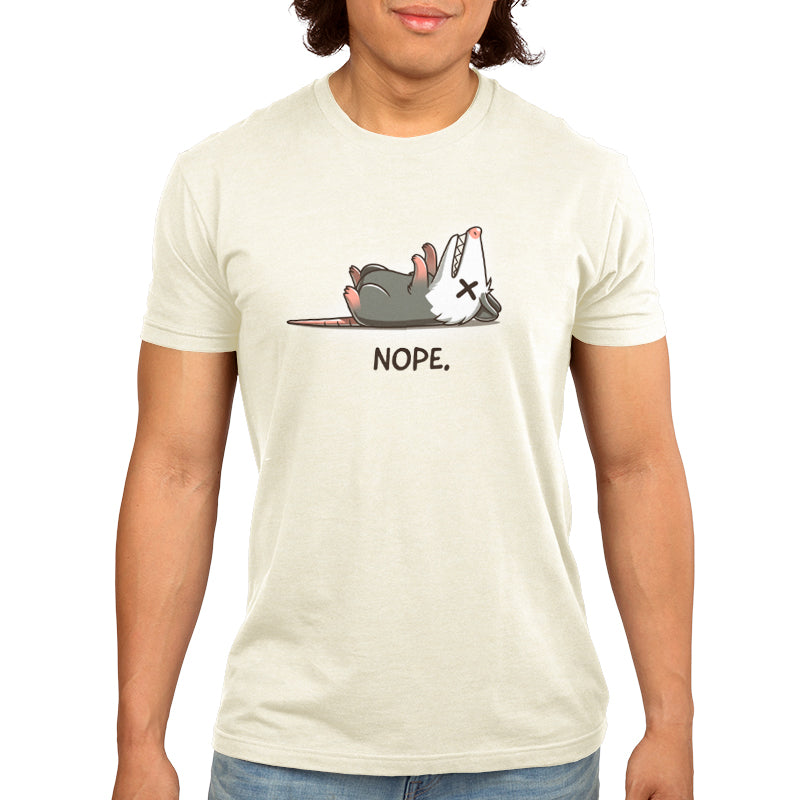 A man wearing a TeeTurtle Nope Opossum t-shirt.