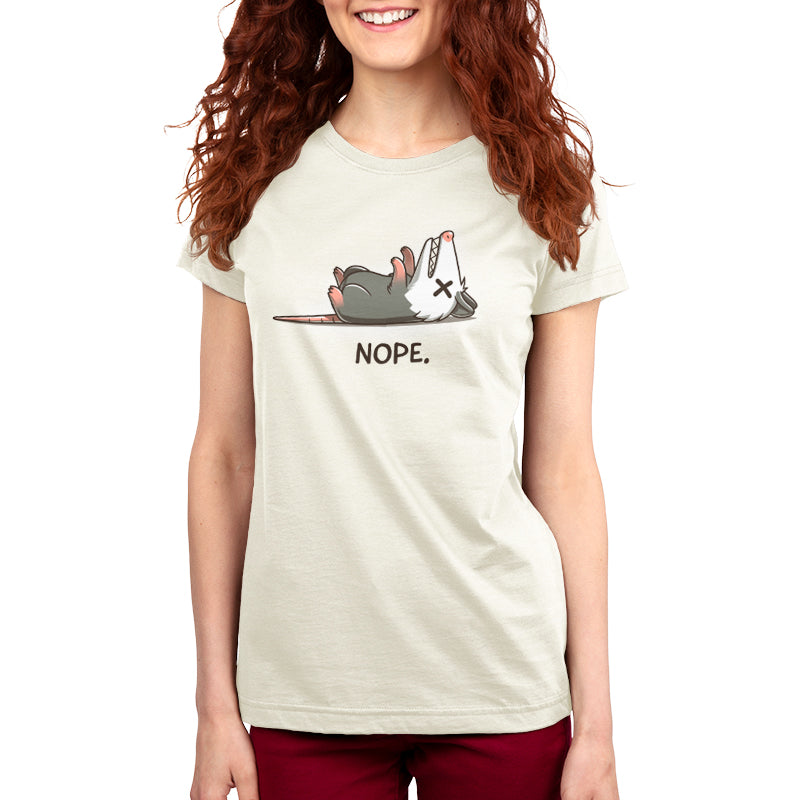 A woman wearing a Teeturtle Nope Opossum t-shirt with the word "hope".
