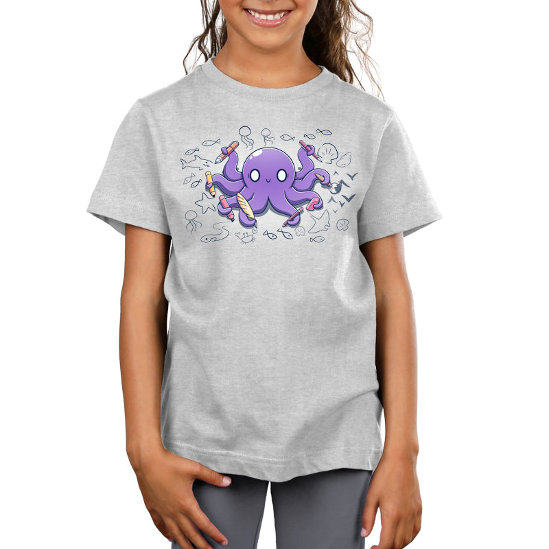 An artistic girl in a grey Octopus Artist t-shirt featuring an octopus design and tentacles from TeeTurtle.