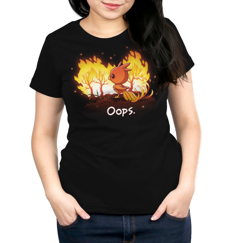A woman wearing a black TeeTurtle T-shirt that says "Oops.