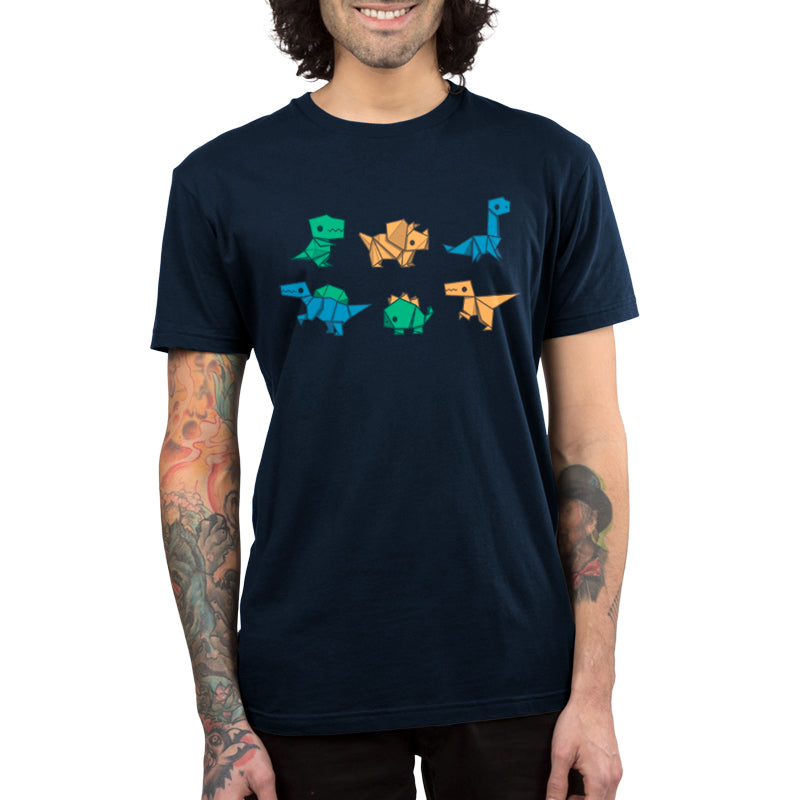 A man wearing a TeeTurtle T-shirt with Origami Dinos on it, experiencing comfort.