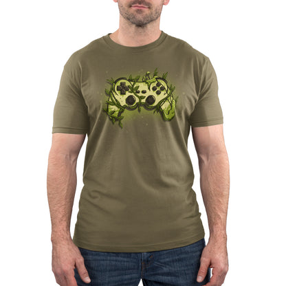 A man wearing a military green t-shirt with an image of a TeeTurtle Overgrown Controller.