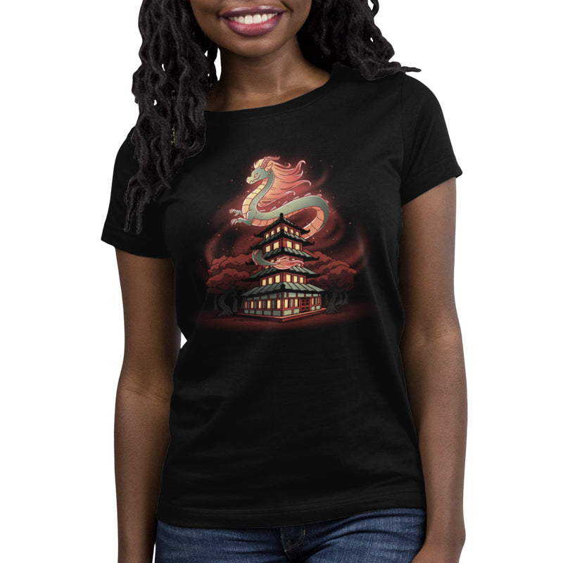 A woman wearing a comfortable black Pagoda Dragon T-shirt by TeeTurtle.