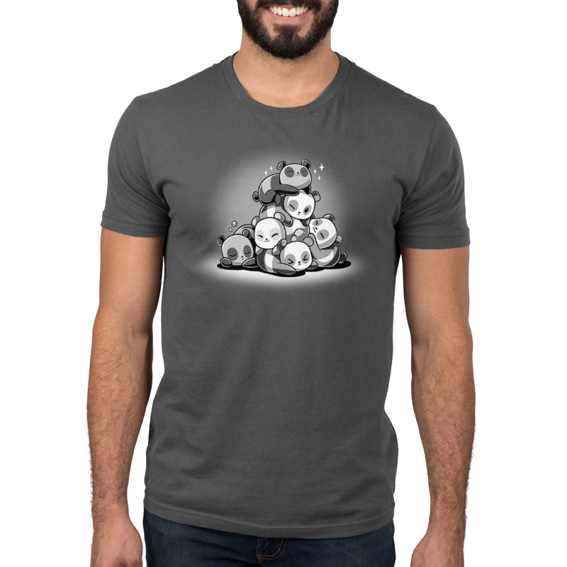 A man wearing a charcoal gray t-shirt with a TeeTurtle Panda Pile on it.