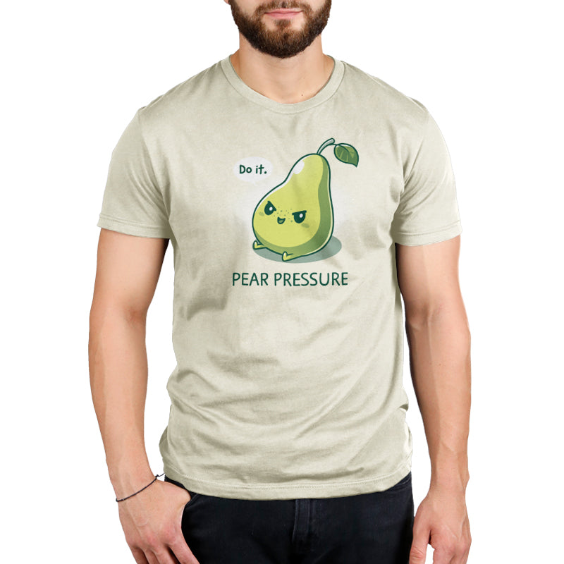 A man wearing a TeeTurtle original t-shirt with the design "Pear Pressure" product by TeeTurtle.
