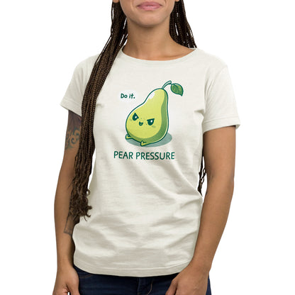 A woman wearing a natural heather t-shirt that says "Pear Pressure" by TeeTurtle.