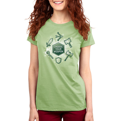 A women's green t-shirt with a customized image of Pixelated Weaponry tools by TeeTurtle.