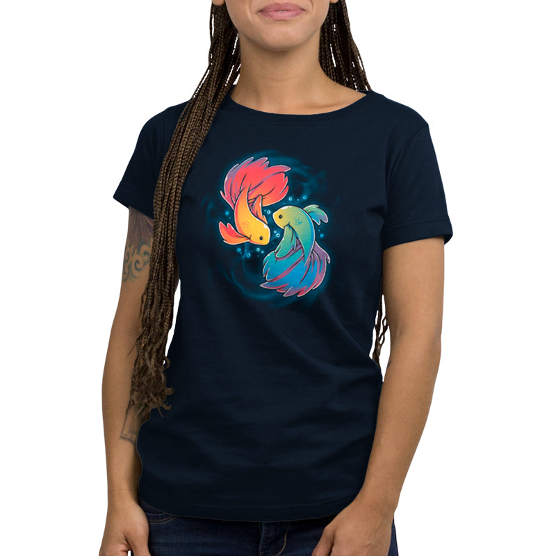 A colorful fish on a navy blue t-shirt, perfect for those who love to show off their TeeTurtle Rainbow Betta.