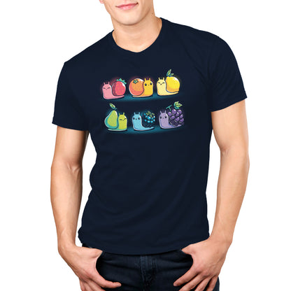 A man wearing a TeeTurtle t-shirt with a cat and Rainbow Fruit Snails by TeeTurtle on it.