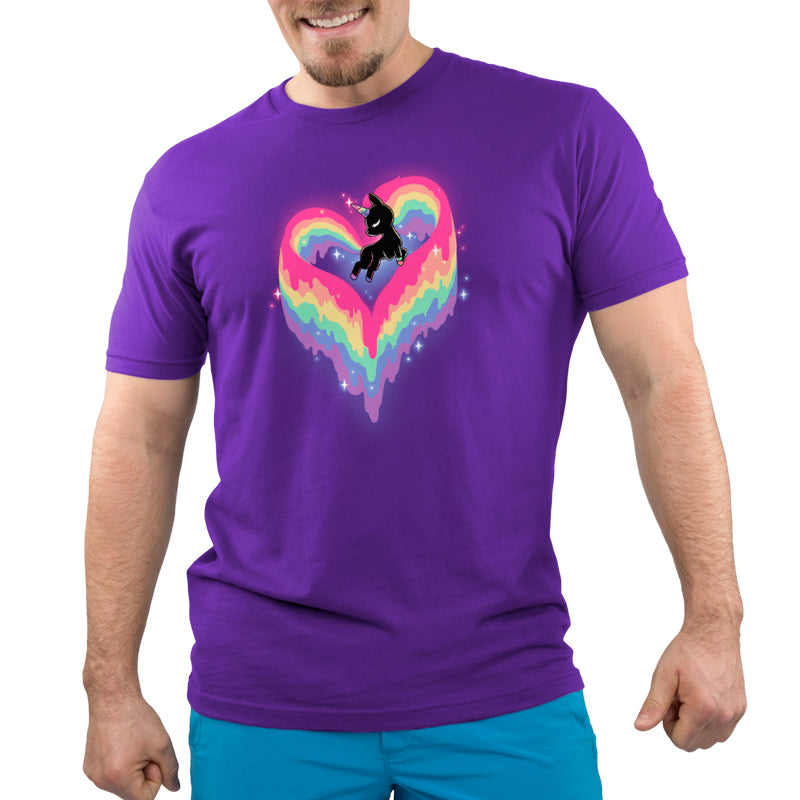 A man wearing a Rainbow Paint Unicorn t-shirt from TeeTurtle with a unicorn print.