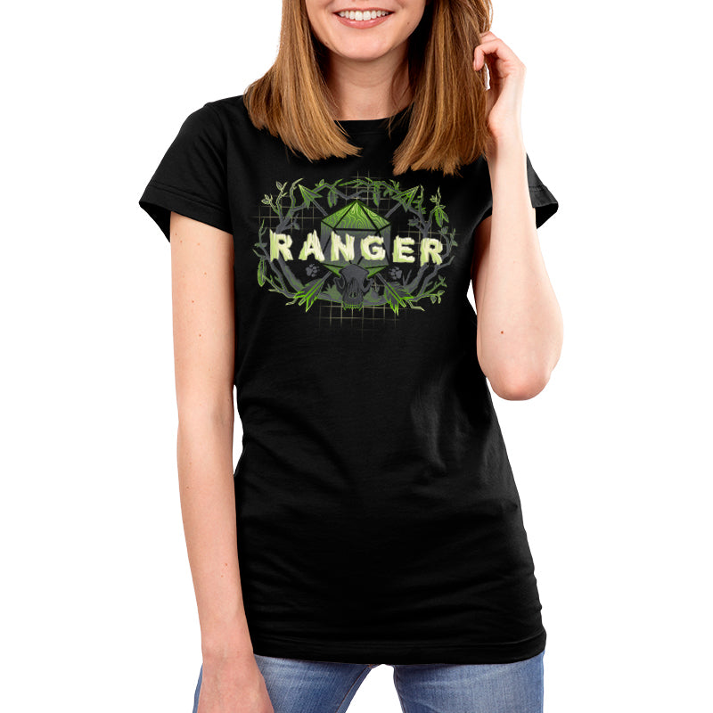 Premium Cotton T-shirt - A person wearing a black Ranger Class apparel from monsterdigital with the word "RANGER" surrounded by green plant illustrations, paired with blue jeans, and smiling. Made from super soft ringspun cotton, this unisex appareloffers both comfort and style.