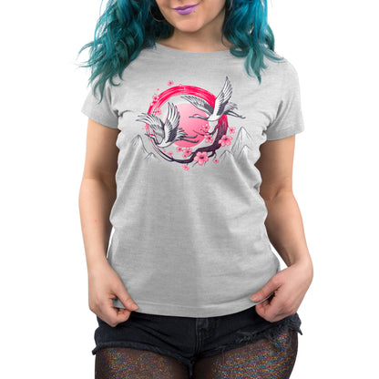 A woman wearing a grey Red-Crowned Cranes t-shirt, made of 100% super soft ringspun cotton, with symbols of longevity including a pink hummingbird on it by TeeTurtle.