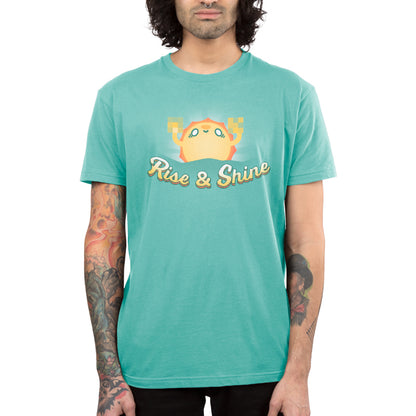 A man wearing a TeeTurtle men's turquoise t-shirt that says Rise & Shine.