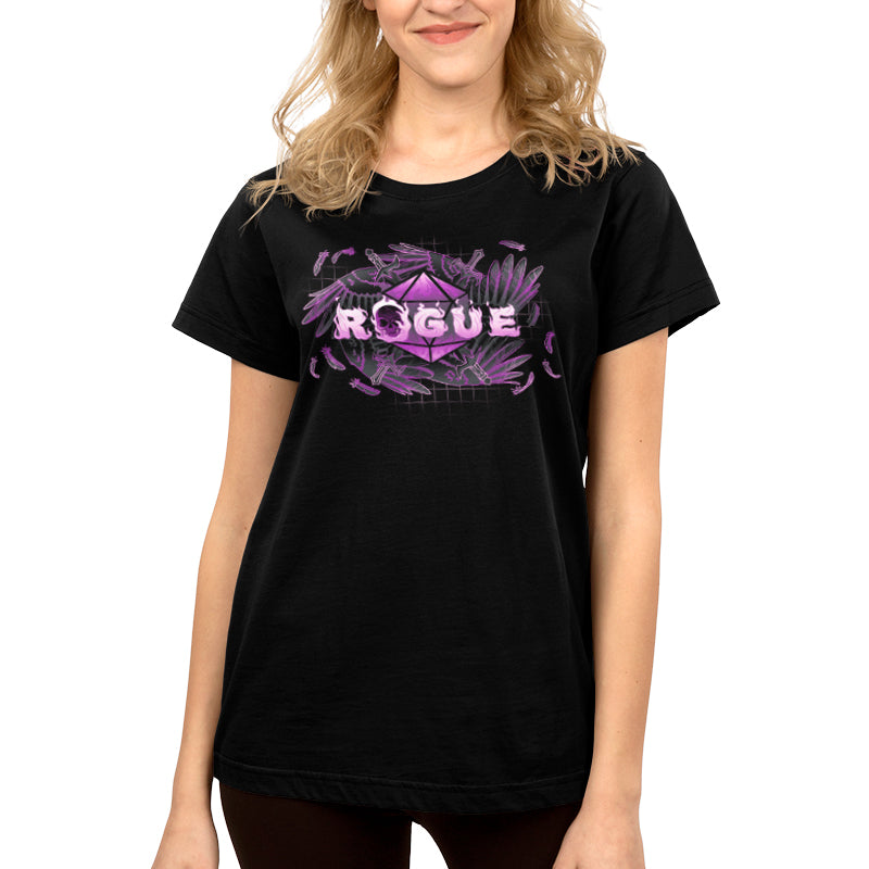 A person wearing a monsterdigital Rogue Class t-shirt made from super soft ringspun cotton, featuring the word "ROGUE" in white letters and surrounded by purple feathers.