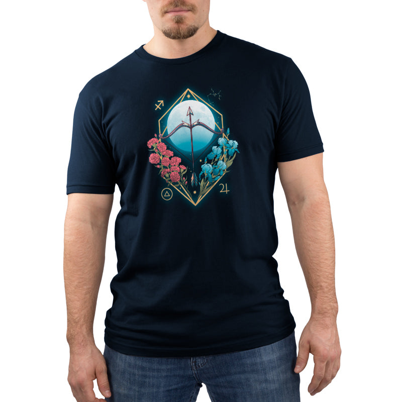 A man wearing a navy blue Sagittarius Zodiac T-shirt with a peace sign and flowers from TeeTurtle.