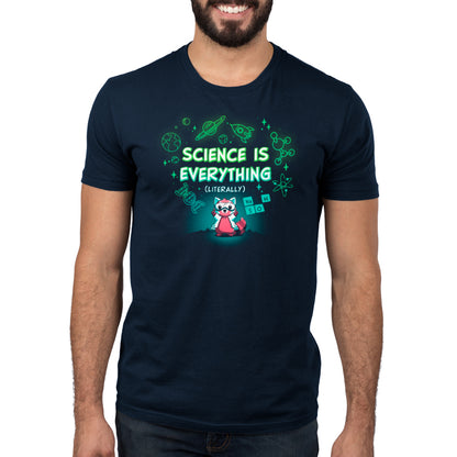 A man sporting a super soft cotton navy blue t-shirt with the text "Science is Literally Everything" and a cartoon character surrounded by science-themed illustrations from monsterdigital.