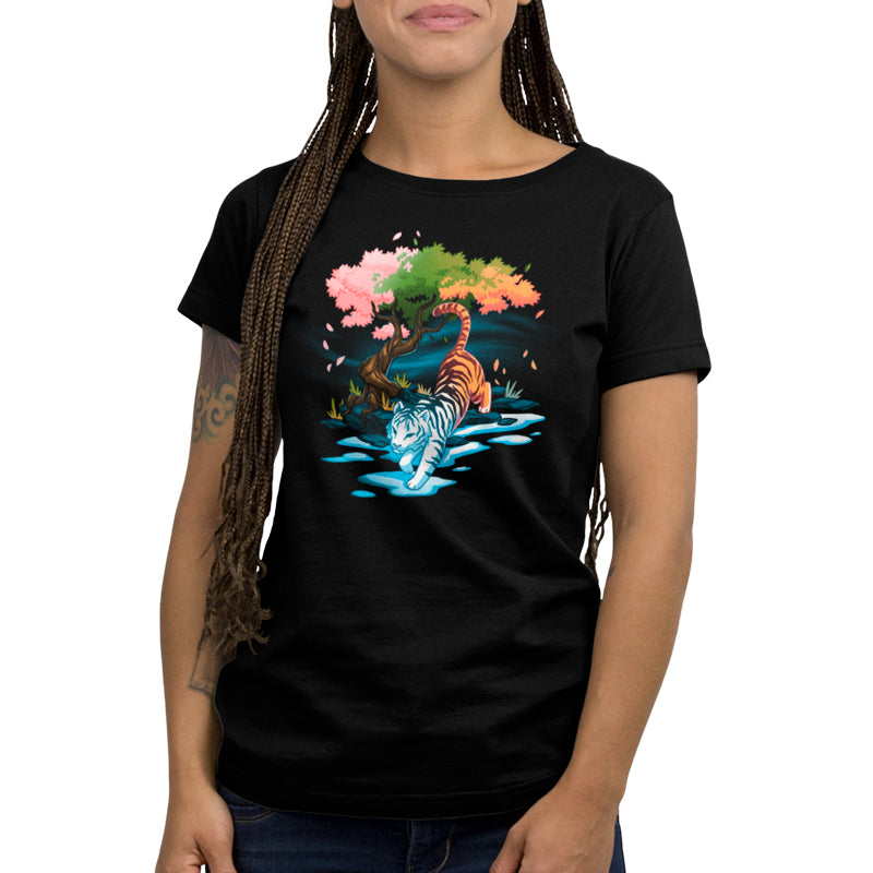 A women's black Season Keeper t-shirt with an image of a tree in nature by TeeTurtle.
