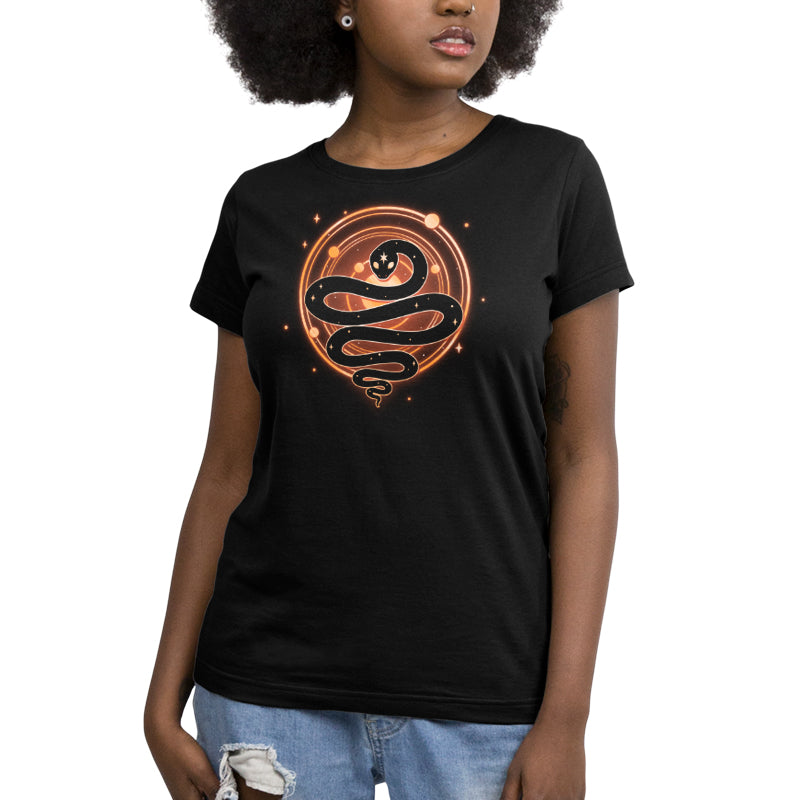 A Serpent of Cosmos T-shirt for women featuring an orange snake design, made with ringspun cotton by TeeTurtle.